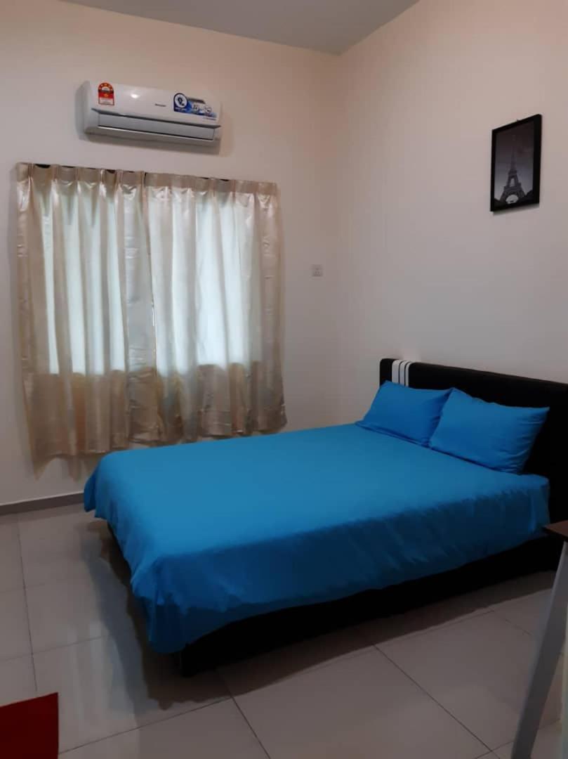 Ipoh EastEden Homestay Værelse billede